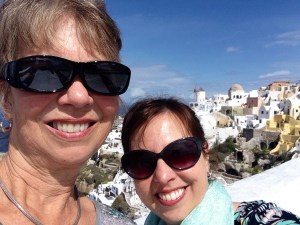My mom and I, with the windmill on the cover of "Murder in Santorini" in the background